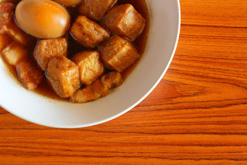 Hard boiled egg in sweet gravy