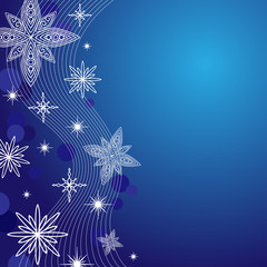 Fototapeta na wymiar white snowflake on blue backgrond
