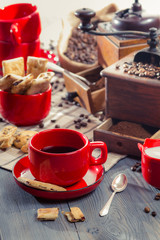 Brewed coffee served with cookie