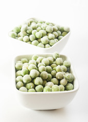 frozen peas close up in white background