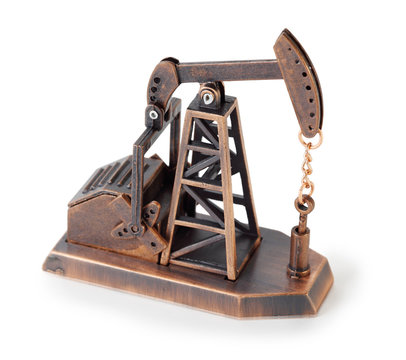 Metal mechanical miniature model of oil derrick isolated