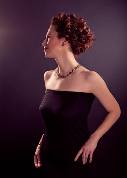 Elegant  Bosomy Mature Woman In  Tight Dress And Red Curly Hair