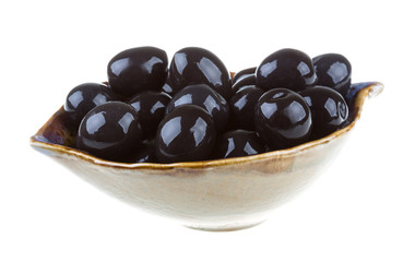 Olives black watered with olive oil in a bowl isolated on a whit