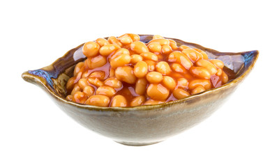 Marinated haricot beans in tomato sauce with shallots on a plate