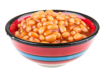 Marinated haricot beans in tomato sauce with shallots on a plate