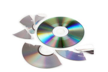Broken and whole disks with information isolated on white