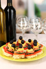 Canapes and wine in restaurant