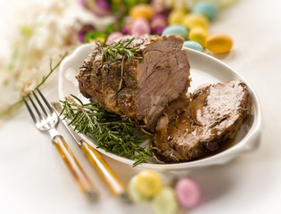 roasted meat over easter table, selective focus