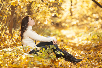 Fashion girl in autumn wood