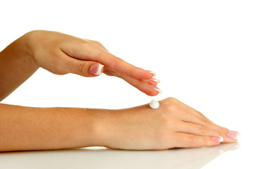 Beautiful woman hands with cream, isolated on white