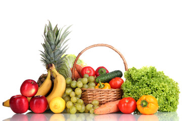 Composition with vegetables and fruits in wicker basket