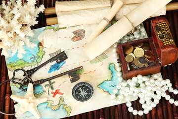 map of treasures on dark wooden background