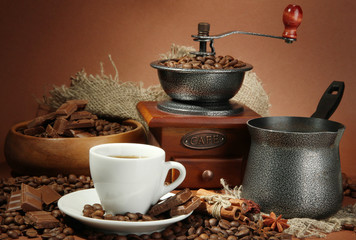 cup of coffee, grinder, turk and coffee beans