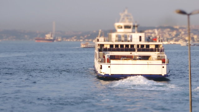 Ferryboat departs from port through the Bosphorus