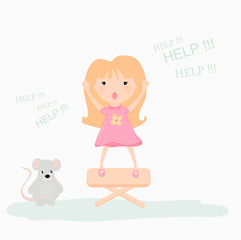 a little girl scared by a mouse