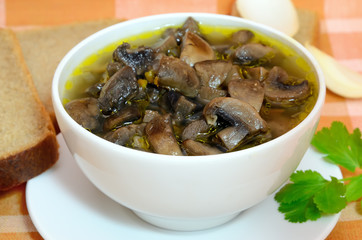 Mushroom soup in a white bowl