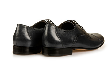 Fashion concept with male shoes on white