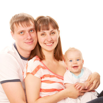 Cheerful young family. Father, mother and baby