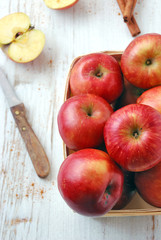 Red apple on wooden table