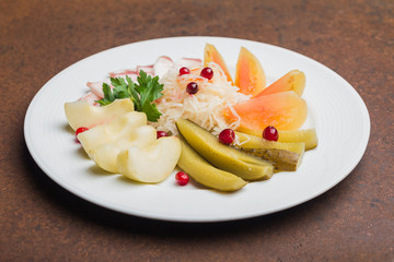 Plate with snacks on the table in a restaurant