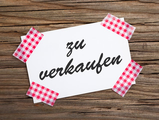 Klebestreifen Zettel auf Holu ZU VERKAUFEN