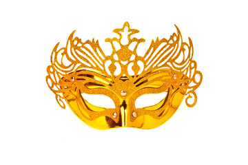 Golden carnival mask on a white background
