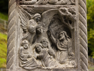 Stone carving image of bible scene in Lourdes, France