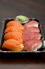 sushi on the black plate, tunny and salmon