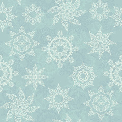 Christmas seamless background with snowflakes in pastel colors