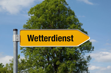 Fototapeta premium Pfeil mit Baum WETTERDIENST