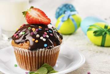 Chocolate muffin with sprinkles