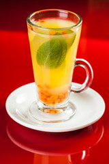Hot drink with mint and sea-buckthorn