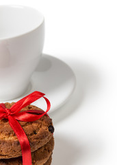 cookies with chocolate pieces and cup