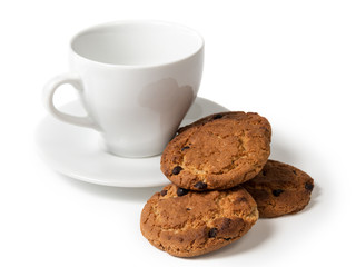 cookies with chocolate pieces and cup