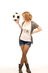 Sexy blonde holding a soccer ball