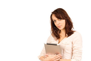 Obraz premium Attractive young brunette holding a tablet