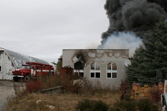  Fire department in action during burning warehouses
