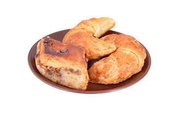 Homemade crescent roll with nut on plate