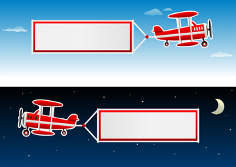 biplane with banners in the sky © Vaytpark