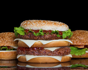 Hamburgers on black background