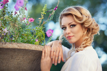 young beautiful girl walks in the park