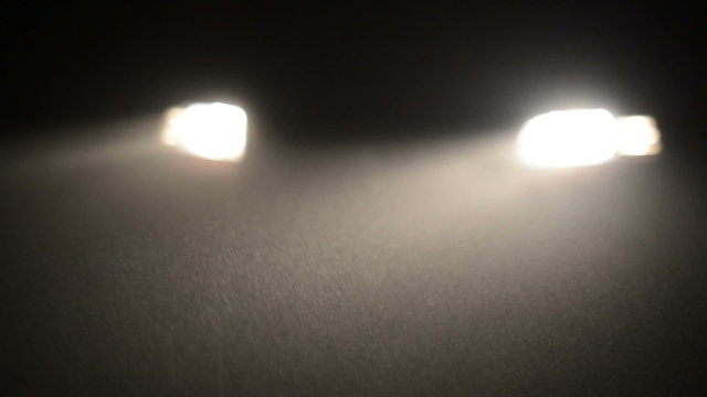 Fog in the headlights of car