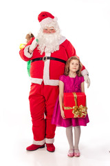 Santa Claus holding  bag and little girl holding gift