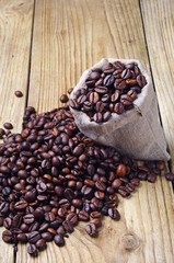 Coffee beans in a sack and spilled