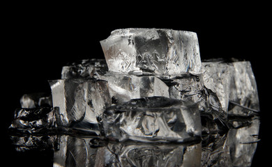 Ice cubes isolated on black