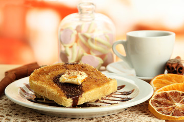White bread toast with chocolate and cup of coffee in cafe