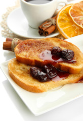 White bread toast with jam and cup of coffee, isolated on white