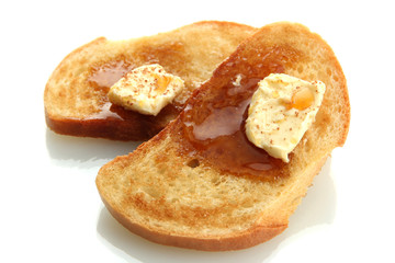 White bread toast with honey on plate, isolated on white