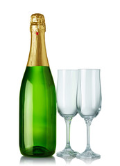 Champagne bottle and two glasses isolated on white