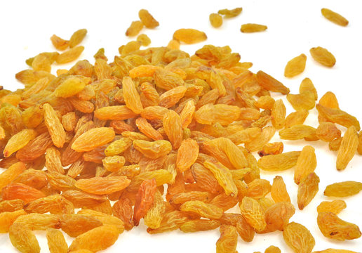 raisins scattered on white background